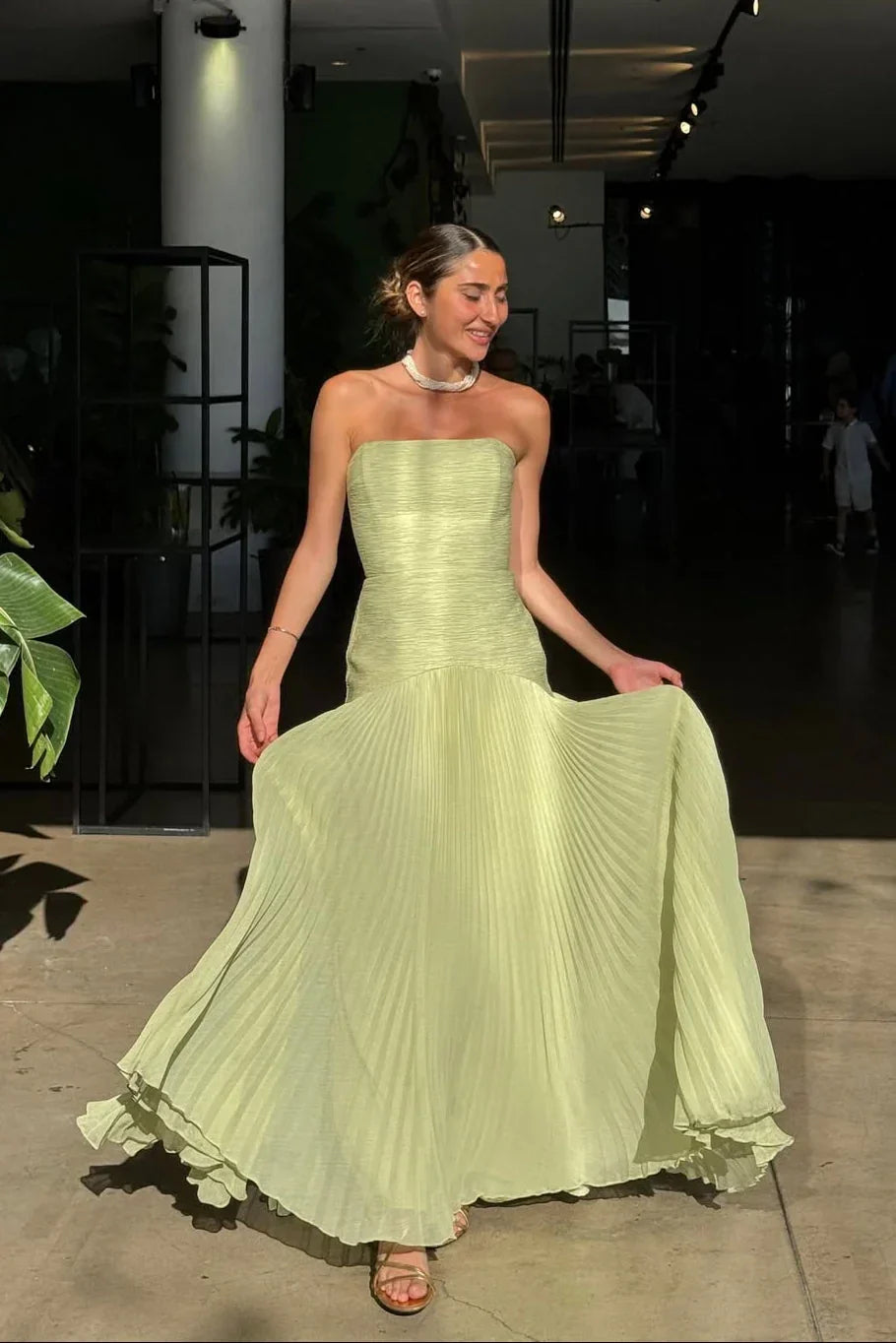 Women's strapless pleated wedding guest dress